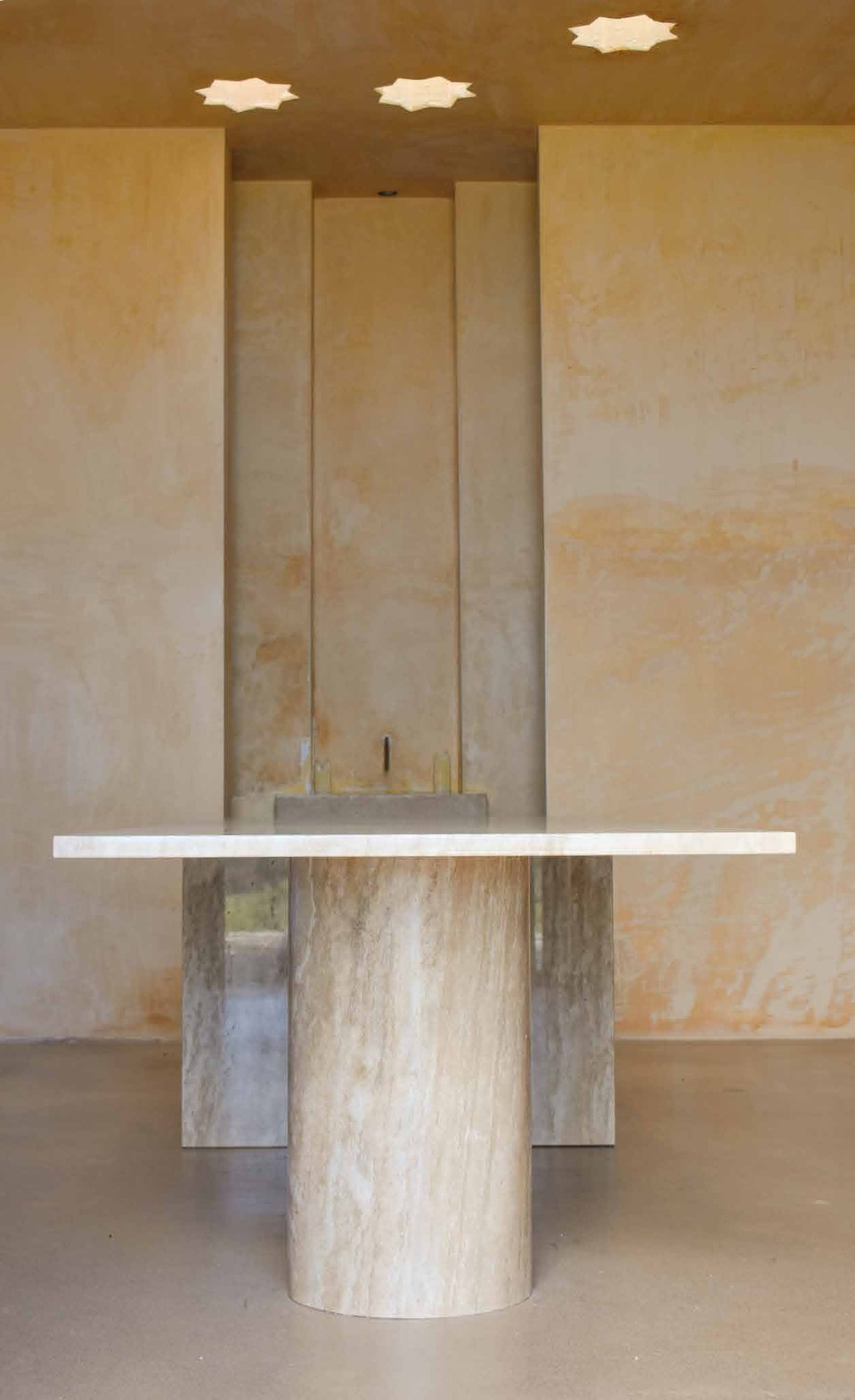Travertine table — refined stonework by Es Bassol Nou